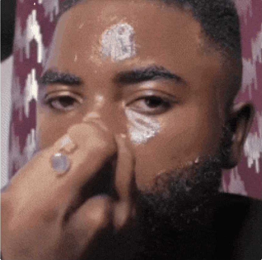Man applying the collagen night wrapping mask