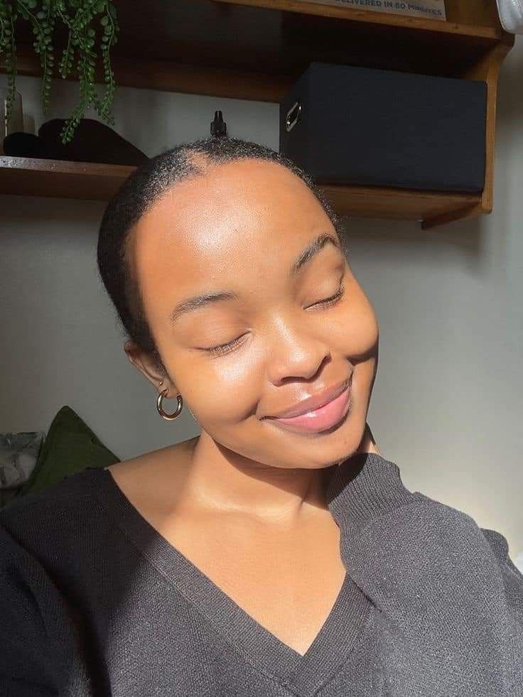Woman smiling with healthy looking skin
