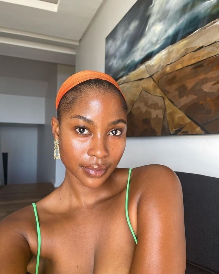 Woman with clear skin and no makeup
